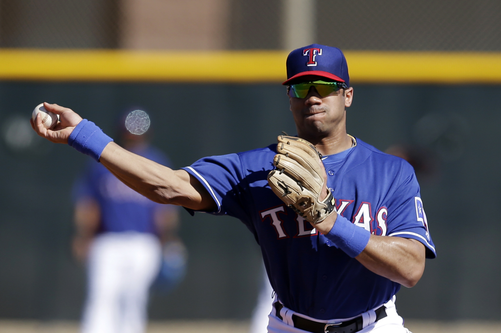 Russell Wilson a hit with Rangers, keeps baseball dream alive
