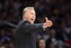 Los Angeles Lakers head coach Mike D'Antoni gestures during the second half of an NBA basketball game against the Sacramento Kings, Friday, Feb. 28, 2014, in Los Angeles. (AP Photo/Mark J. Terrill)
