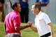 LAKE FOREST, IL - SEPTEMBER 14: Tiger Woods (L) and Sergio Garcia of Spain shake hands on the 18th green during the Third Round of the BMW Championship at Conway Farms Golf Club on September 14, 2013 in Lake Forest, Illinois. (Photo by Sam Greenwood/Getty Images)