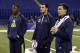 Texas A&M quarterback Johnny Manziel, right, Fresno State quarterback Derek Carr, center, and Louisville quarterback Teddy Bridgewater watch drills at the NFL football scouting combine in Indianapolis, Sunday, Feb. 23, 2014. (AP Photo/Michael Conroy)