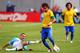 EAST RUTHERFORD, NJ - JUNE 9: Pablo Guinazu #18 of Argentina makes a slide tackle on Neymar #11 of Brazil during the second half of an international friendly soccer match on June 9, 2012 at MetLife Stadium in East Rutherford, New Jersey. (Photo by Rich Schultz/Getty Images)