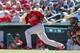 JUPITER, FL - MARCH 1: Mark Ellis #3 of the St Louis Cardinals hits the ball against the Miami Marlins during a spring training game at Roger Dean Stadium on March 1, 2014 in Jupiter, Florida. (Photo by Joel Auerbach/Getty Images)
