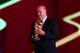 COSTA DO SAUIPE, BRAZIL - DECEMBER 06: Spain coach Vicente del Bosque holds the World Cup trophy on stage before the Final Draw for the 2014 FIFA World Cup Brazil at Costa do Sauipe Resort on December 6, 2013 in Costa do Sauipe, Bahia, Brazil. (Photo by Clive Mason/Getty Images)