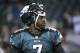 Philadelphia Eagles' Michael Vick warms up before the first half of an NFL football game between the Philadelphia Eagles and the Chicago Bears, Sunday, Dec. 22, 2013, in Philadelphia. (AP Photo/Matt Rourke)