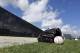 A ball and glove sit in the grass at the St. Louis Cardinals spring training baseball practice facility Wednesday, Feb. 12, 2014, in Jupiter, Fla. (AP Photo/Jeff Roberson)