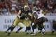 New Orleans Saints tackle Zach Strief (64) blocks during the second half of an NFL football game against the Tampa Bay Buccaneers in Tampa, Fla., Sunday, Sept. 15, 2013.(AP Photo/Phelan M. Ebenhack)