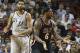 After fouling San Antonio Spurs' Tim Duncan (21), Miami Heat's LeBron James (6) reacts as he is charged with a technical foul also, during the second half of an NBA basketball game in Miami, Sunday, Jan. 26, 2014. The Heat won 113-101. (AP Photo/J Pat Carter)