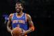 New York Knicks forward Amar'e Stoudemire (1) smiles before shooting a free throw in the second half of their NBA basketball game against the Brooklyn Nets at the Barclays Center, Thursday, Dec. 5, 2013, in New York. (AP Photo/Kathy Willens)