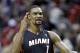 Miami Heat center Chris Bosh celebrates after sinking a three point shot with less than a second to go to win the game against the Portland Trail Blazers during an NBA basketball game in Portland, Ore., Saturday, Dec. 28, 2013. Bosh led the Heat in scoring with 37 points as they beat the Trail Blazers 108-107. (AP Photo/Don Ryan)