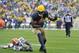 GREEN BAY, WI - OCTOBER 20: Tight end Jermichael Finley #88 of the Green Bay Packers runs after a catch for a 10-yard touchdown reception during the first quarter against the Cleveland Browns at Lambeau Field on October 20, 2013 in Green Bay, Wisconsin. (Photo by Brian Kersey/Getty Images)