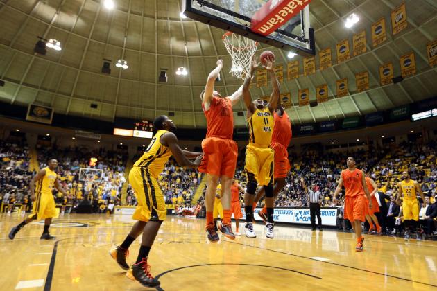 Feb 22, 2014; Hattiesburg, MS, USA; UTEP Miners forward Cedrick Lang (31) and Southern Miss Golden Eagles forward Daveon Boardingham (11) vie for a rebound in the second half at Reed Green Coliseum. Southern Miss won, 77-68. Mandatory Credit: Chuck Cook-USA TODAY Sports