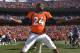 Denver Broncos cornerback Champ Bailey (24) warms up before the AFC Championship NFL playoff football game against New England Patriots in Denver, Sunday, Jan. 19, 2014. (AP Photo/Jack Dempsey)