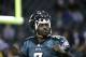 Philadelphia Eagles' Michael Vick warms up before the first half of an NFL football game between the Philadelphia Eagles and the Chicago Bears, Sunday, Dec. 22, 2013, in Philadelphia. (AP Photo/Matt Rourke)