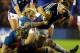 France's Guilhem Guirado, right, is tackled by Scotland's Richie Gray, center, and Kelly Brown during their Six Nations rugby union international match at Murrayfield in Edinburgh, Scotland, Saturday March 8, 2014. (AP Photo/Scott Heppell)