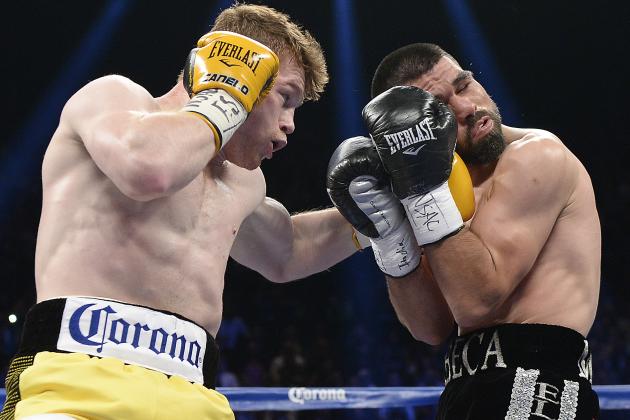 LAS VEGAS, NV - MARCH 8: Canelo Alvarez throws a punch against Alfredo Angulo during their non-title, 12-round super welterweight bout at the MGM Grand Garden March 8, 2014, in Las Vegas, Nevada. (Photo by Kevork Djansezian/Getty Images)