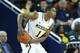 ANN ARBOR, MI - FEBRUARY 05: Glenn Robinson III #1 of the Michigan Wolverines gets ready to shoot the ball during the second half of the game against the Nebraska Cornhuskers at Crisler Arena on February 5, 2014 in Ann Arbor, Michigan. The Wolverines defeated the Cornhuskers 79-50. (Photo by Leon Halip/Getty Images)