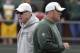 Green Bay Packers head coach Mike McCarthy talks to general manager Ted Thompson during NFL football training camp Sunday, July 28, 2013, in Green Bay, Wis. (AP Photo/Morry Gash)