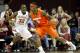 Mar 9, 2014; Tallahassee, FL, USA; Syracuse Orange forward C.J. Fair (5) dribbles around Florida State Seminoles guard Montay Brandon (32) during the first half at Donald L. Tucker Center. Syracuse defeated Florida State 74-58. Mandatory Credit: Matt Stamey-USA TODAY Sports