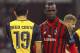 MILAN, ITALY - FEBRUARY 19: Mario Balotelli (R) of AC Milan and Diego Costa of Club Atletico de Madrid look on during the UEFA Champions League Round of 16 match between AC Milan and Club Atletico de Madrid at Stadio Giuseppe Meazza on February 19, 2014 in Milan, Italy. (Photo by Marco Luzzani/Getty Images)