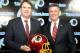 Jan 9, 2014; Ashburn, VA, USA; Washington Redskins head coach Jay Gruden and general manager Bruce Allen pose for a photo after a press conferences at Redskins Park Team Auditorium. Mandatory Credit: Brad Mills-USA TODAY Sports