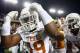 FORT WORTH, TX - OCTOBER 27: Peter Jinkens #19 of the Texas Longhorns celebrates after the Longhorns beat the TCU Horned Frogs 30-7 at Amon G. Carter Stadium on October 27, 2013 in Fort Worth, Texas. (Photo by Tom Pennington/Getty Images)