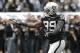 Oakland Raiders defensive end Lamarr Houston (99) before an NFL football game against the Pittsburgh Steelers in Oakland, Calif., Sunday, Oct. 27, 2013. (AP Photo/Ben Margot)