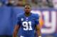 Nov 10, 2013; East Rutherford, NJ, USA; New York Giants defensive end Justin Tuck (91) during the game against the Oakland Raiders at MetLife Stadium. The Giants defeated the Raiders 24-20. Mandatory Credit: Kirby Lee-USA TODAY Sports