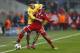 Arsenal's Mesut Ozil, left, and Bayern's Thiago Alcantara challenge for the ball during the Champions League round of 16 second leg soccer match between FC Bayern Munich and FC Arsenal in Munich, Germany, Wednesday, March 12, 2014. (AP Photo/Matthias Schrader)