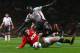 MANCHESTER, ENGLAND - SEPTEMBER 25: Wayne Rooney of Manchester United tangles with Mamadou Sakho of Liverpool during the Capital One Cup Third Round match betwen Manchester United and Liverpool at Old Trafford on September 25, 2013 in Manchester, England. (Photo by Julian Finney/Getty Images)
