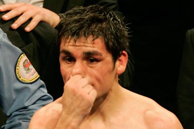 Argentina's light flyweight Juan Carlos Reveco reacts after losing his WBA light flyweight World Champion title against France's boxer Brahim Asloum, Saturday, Dec. 8, 2007, in Le Cannet, southern France.  Asloum won the fight on unanimous decision. (AP Photo/Lionel Cironneau)
