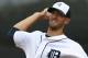 Detroit Tigers starting pitcher Rick Porcello warms up before the second inning of an exhibition baseball game against the Pittsburgh Pirates in Lakeland, Fla., Tuesday, March 4, 2014. The Pirates won 5-2. (AP Photo/Gene J. Puskar)