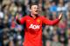 Manchester United's Wayne Rooney shouts instructions to team mates during the English Premier League soccer match between West Bromwich Albion and Manchester United at The Hawthorns Stadium in West Bromwich, England, Saturday, March 8, 2014. (AP Photo/Rui Vieira)