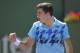 Milos Raonic, of Canada, reacts after beating Andy Murray, of Great Britain, during a fourth round match at the BNP Paribas Open tennis tournament, Wednesday, March 12, 2014, in Indian Wells, Calif. Roanic won 4-6, 7-5, 6-3. (AP Photo/Mark J. Terrill)