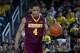 Minnesota guard Deandre Mathieu (4) dribbles the ball in the second half of an NCAA college basketball game against Michigan at Crisler Center in Ann Arbor, Mich., Saturday, March 1, 2014. Michigan won 66-56. (AP Photo/Tony Ding)
