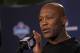 Tampa Bay Buccaneers head coach Lovie Smith answers a question during a news conference at the NFL football scouting combine in Indianapolis, Thursday, Feb. 20, 2014. (AP Photo/Michael Conroy)