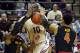 Jan 12, 2014; Tallahassee, FL, USA; Florida State Seminoles forward Okaro White (10) is fouled as he is defended by Maryland Terrapins guard Seth Allen (4) and guard Nick Faust (5) during the first half at Donald L. Tucker Center. Mandatory Credit: Melina Vastola-USA TODAY Sports