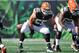 CINCINNATI, OH - SEPTEMBER 16: Alex Mack #55 of the Cleveland Browns snaps the ball from center against the Cincinnati Bengals at Paul Brown Stadium on September 16, 2012 in Cincinnati, Ohio. (Photo by Jamie Sabau/Getty Images)