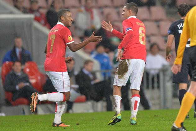 PSV's Adam Maher  celebrates with teammate Luciano Narsing, left,  after scoring against Dinamo Zagreb  during a Europa League group B  soccer match between PSV Eindhoven and Dinamo Zagreb at the Philips stadium in Eindhoven, southern Netherlands, Thursday, Nov.7, 2013.(AP Photo/Ermindo Armino)