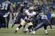 New Orleans Saints running back Darren Sproles (43) runs against Seattle Seahawks free safety Earl Thomas (29) during an NFC divisional playoff NFL football game in Seattle, Saturday, Jan. 11, 2014. (AP Photo/Elaine Thompson)
