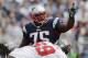 FOXBORO, MA - SEPTEMBER 22: Vince Wilfork #75 of the New England Patriots signals to the defense during the second half of their 23-3 win over the Tampa Bay Buccaneers at Gillette Stadium on September 22, 2013 in Foxboro, Massachusetts. (Photo by Winslow Townson/Getty Images)