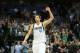 Mar 9, 2014; Dallas, TX, USA; Dallas Mavericks forward Dirk Nowitzki (41) celebrates late in the fourth quarter after his team made a three point basket against the Indiana Pacers at American Airlines Center. The Mavs beat the Pacers 105-94. Mandatory Credit: Matthew Emmons-USA TODAY Sports