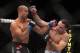 Frankie Edgar, right, in action against BJ Penn during their UFC fight at the TD Garden on Saturday, August 28, 2010 in Boston, MA. Edgar retained his UFC lightweight title via unanimous decision. (AP Photo/Gregory Payan)