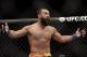 Johny Hendricks reacts following a UFC 167 mixed martial arts championship welterweight bout against Georges St. Pierre, of Canada, on Saturday, Nov. 16, 2013, in Las Vegas. St. Pierre won by split decision. (AP Photo/Isaac Brekken)