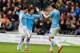 HULL, ENGLAND - MARCH 15: Edin Dzeko (R) of Manchester City celerates with teammates Jesus Navas (L) and David Silva (C) after scoring his team's second goal during the Barclays Premier league match between Hull City and Manchester City at KC Stadium on March 15, 2014 in Hull, England. (Photo by Paul Thomas/Getty Images)
