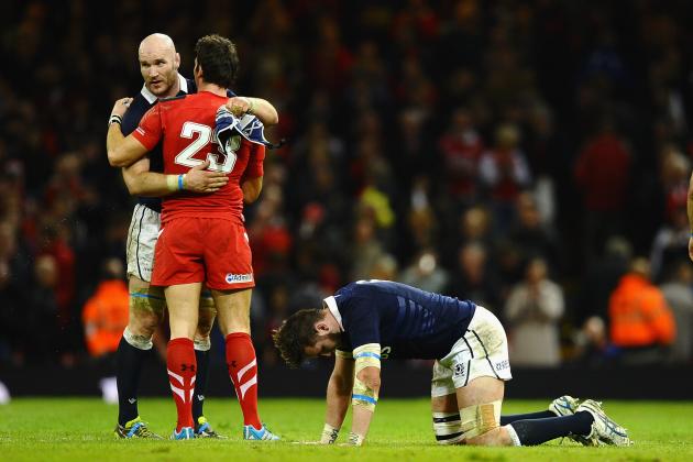CARDIFF, WALES - MARCH 15: Ryan Wilson of Scotland falls to his knees after a heavy defeat in the RBS Six Nations match between Wales and Scotland at Millennium Stadium on March 15, 2014 in Cardiff, Wales. (Photo by Laurence Griffiths/Getty Images)