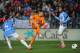 MALAGA, SPAIN - MARCH 15: Cristiano Ronaldo (C) of Real Madrid shoots past Marcos Angeleri (R) and Flavio Ferreira of Malaga during the La Liga match between Malaga and Real Madrid at La Rosaleda Stadium on March 15, 2014 in Malaga, Spain. (Photo by Denis Doyle/Getty Images)