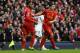 LIVERPOOL, ENGLAND - FEBRUARY 23: Daniel Sturridge (L) of Liverpool celebrates scoring his team's third goal with Luis Suarez during the Barclays Premier League match between Liverpool and Swansea City at Anfield on February 23, 2014 in Liverpool, England. (Photo by Clive Brunskill/Getty Images)