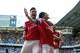 Arsenal's Tomas Rosicky, right, celebrates scoring with teammate Olivier Giroud during the English Premier League soccer match between Tottenham Hotspur and Arsenal at White Hart Lane stadium in London, Sunday, March 16, 2014. (AP Photo/Matt Dunham)