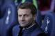 Tottenham Hotspur's manager Tim Sherwood looks up as he sits in the technical area prior to the start of the English Premier League soccer match between Tottenham Hotspur and Arsenal at White Hart Lane stadium in London, Sunday, March 16, 2014. (AP Photo/Matt Dunham)