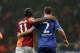 Former Chelsea star, Didier Drogba of Galatasaray, left, and Branislav Ivanovic of Chelsea during their Champions League Round of 16, First Leg match between Galatasaray and Chelsea at Turk Telekom Arena Stadium in Istanbul, Turkey, Wednesday, Feb. 26, 2014. (AP Photo/Emrah Gurel)